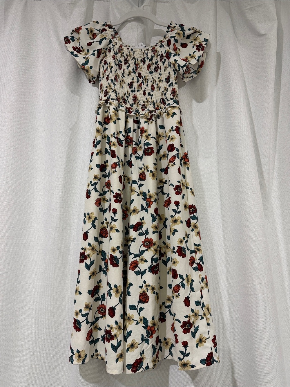 Ivy City Co Cream Floral Smocked Maxi Jumpsuit with Red & Green Print